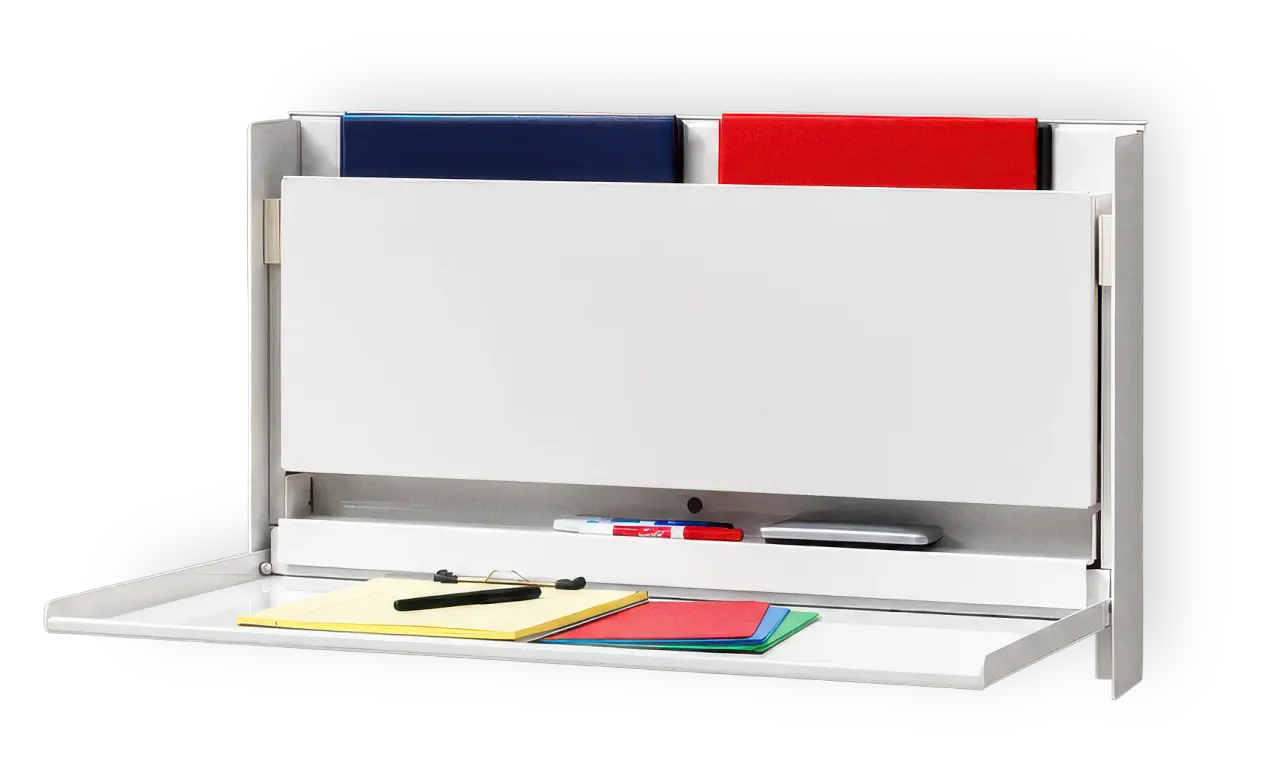 A wall-mounted Charting Station open, two binders standing behind the writing surface and a clipboard and folders laid on it