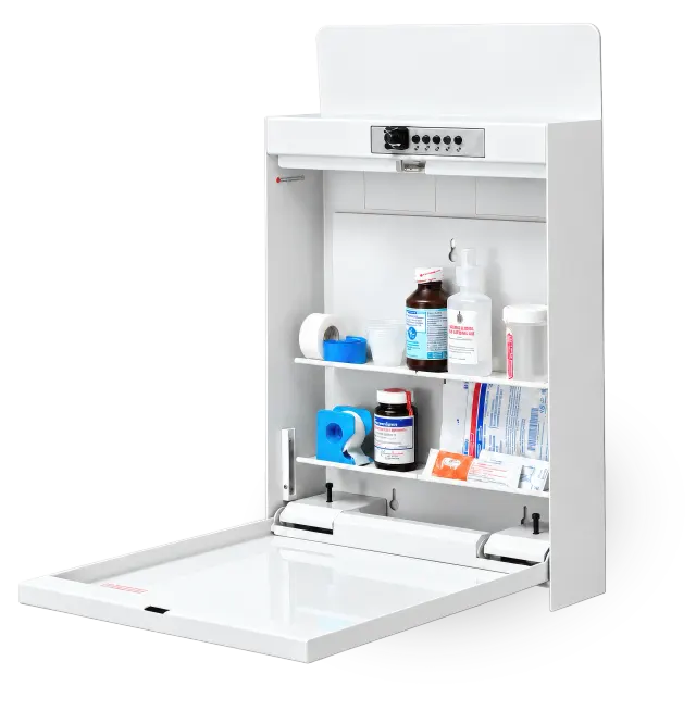 A wall-mounted Custom Medication Storage cabinet with a keypad lock, open: medications on two shelves above the fold-down worksurface